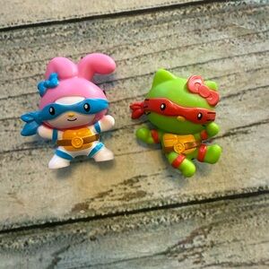 2025 Hello Kitty Teenage Mutant Ninja Turtles Rapheal
Action Figure & My Melody